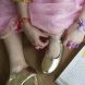 Glimmende gouden muiltjes met hak